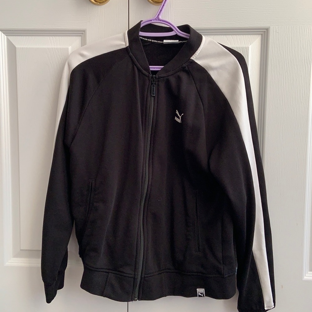 Puma black zip up sweater with white stripe and big puma logo on the back